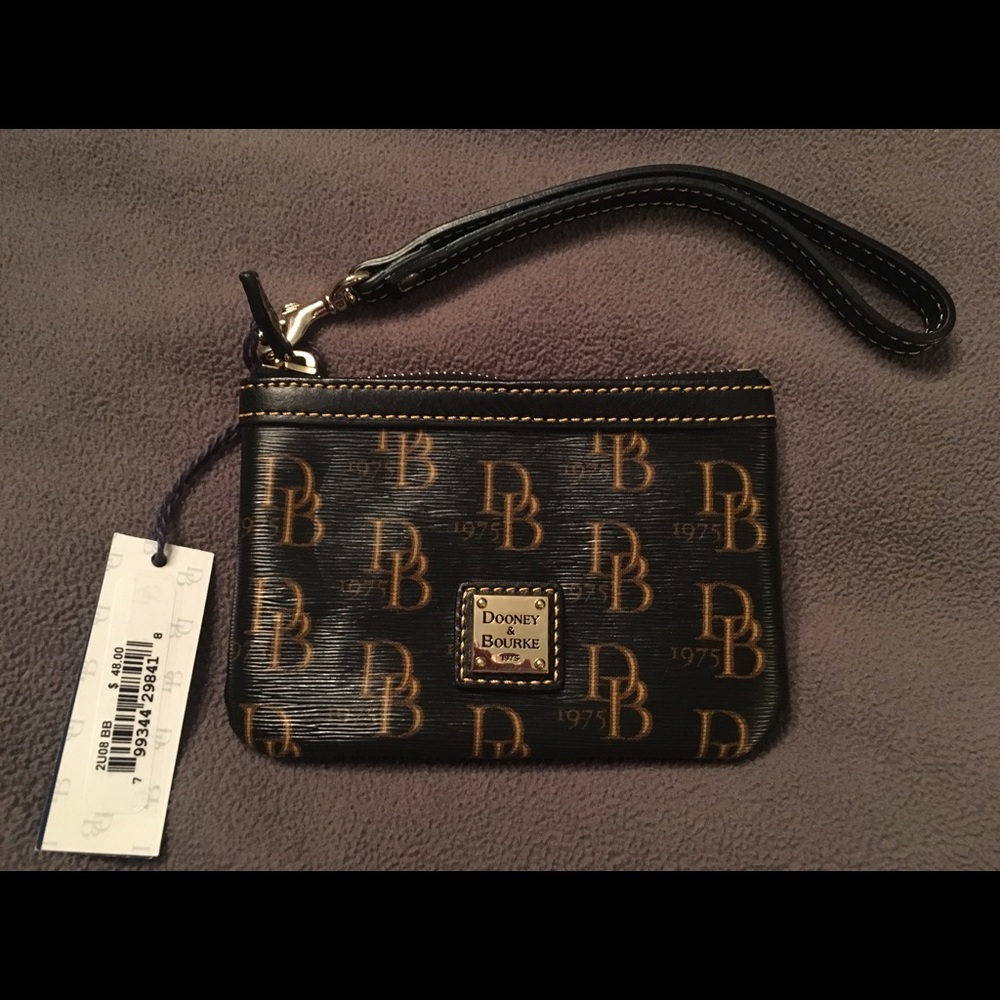 Brand new Dooney & Bourke wristlet